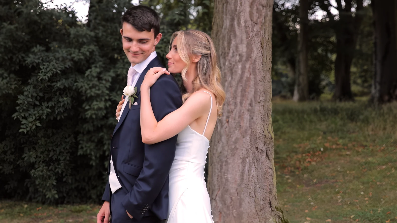 Bethany and Liam embracing in a Paris park
